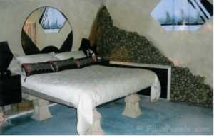 Stone veneer panels complete this bedroom design.