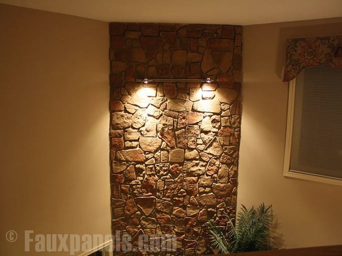 Manufactured stone veneer makes a lively accent wall in any room.
