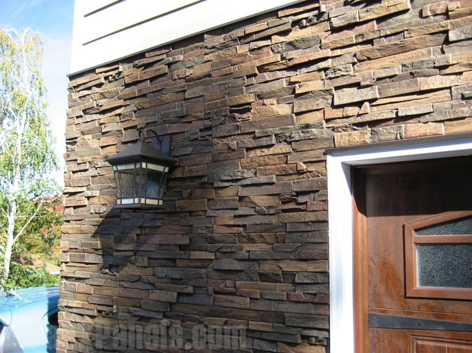 Home exterior with the impressive look of real stone.