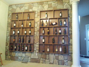 Using faux stone panels molded from New England fieldstone, Julie was able to transform the look of her vintage wine shelving to resemble a French wine cellar.
