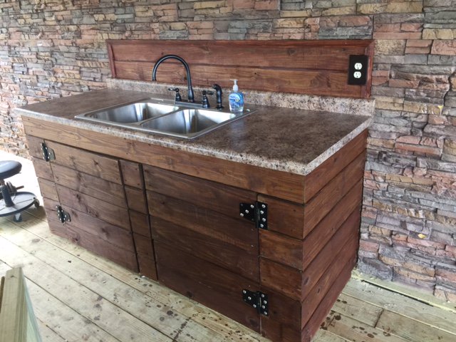 Customized kitchen units paired perfectly with the panels on the wall.