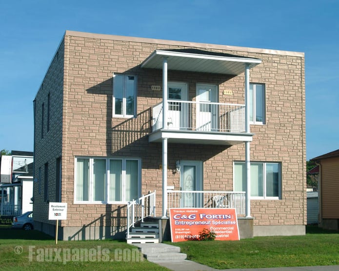 Man made stone panels give commercial buildings added visual appeal.