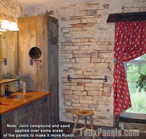 Rustic bathroom design with uncovered stone look walls created with panels, sand and joint compound.