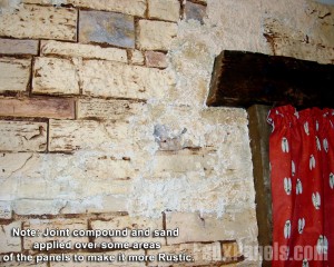 Stone look panels mixed with joint compound and sand