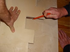  Line up the corner where you marked it previously.
