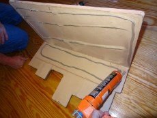 Start your faux panel installation with a corner.