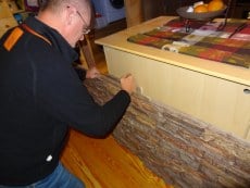 Dry fit a new panel and mark it as needed to show where the panel meets the corner piece.