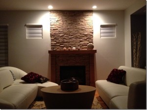 DIY fireplace project completed with synthetic stone panels
