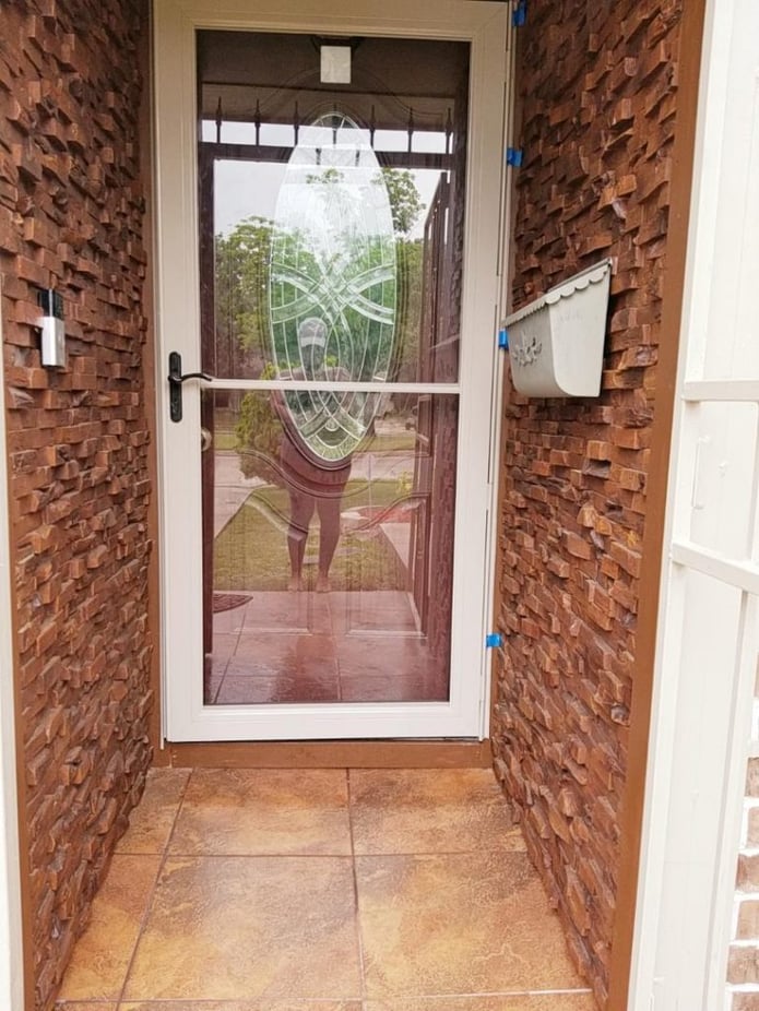 Front entrance with new Wood Plank panels installed.